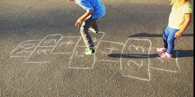 Children playing hopscotch
