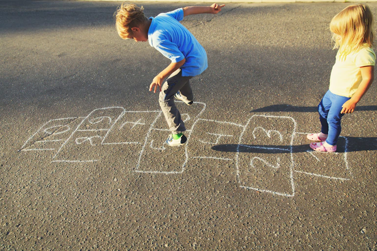 Children playing hopscotch