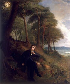 Painting of John Keats sat on a riverbank, looking at the moon with trees in the background.