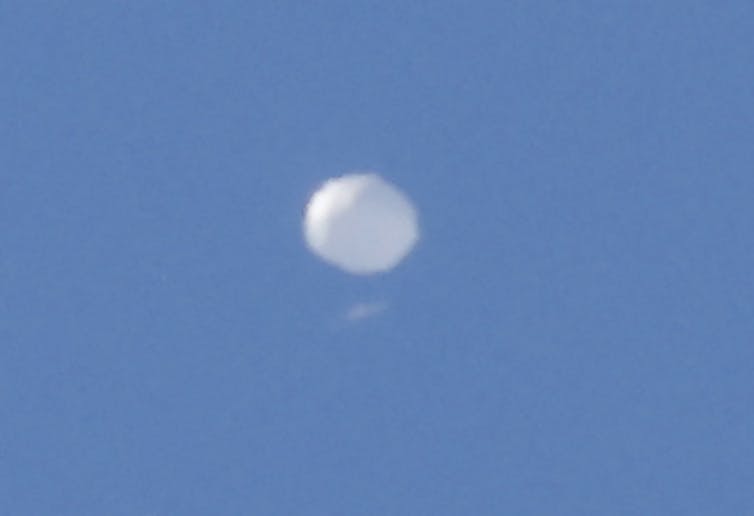 The high-altitude balloon belonging to China is pictured here on 4 February as it passed over Charlotte, North Carolina