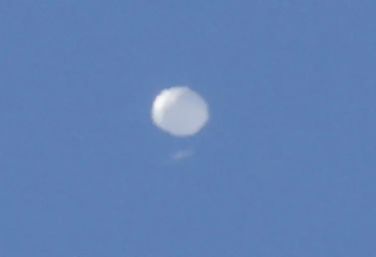 The high-altitude balloon belonging to China is pictured here on 4 February as it passed over Charlotte, North Carolina