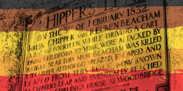 Memorial plaque superimposed with red, yellow, brown and black colours
