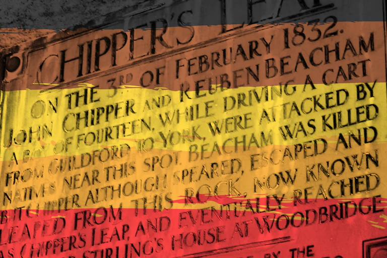 Memorial plaque superimposed with red, yellow, brown and black colours