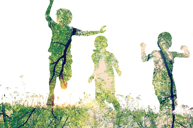 Children silhouetted against white background.