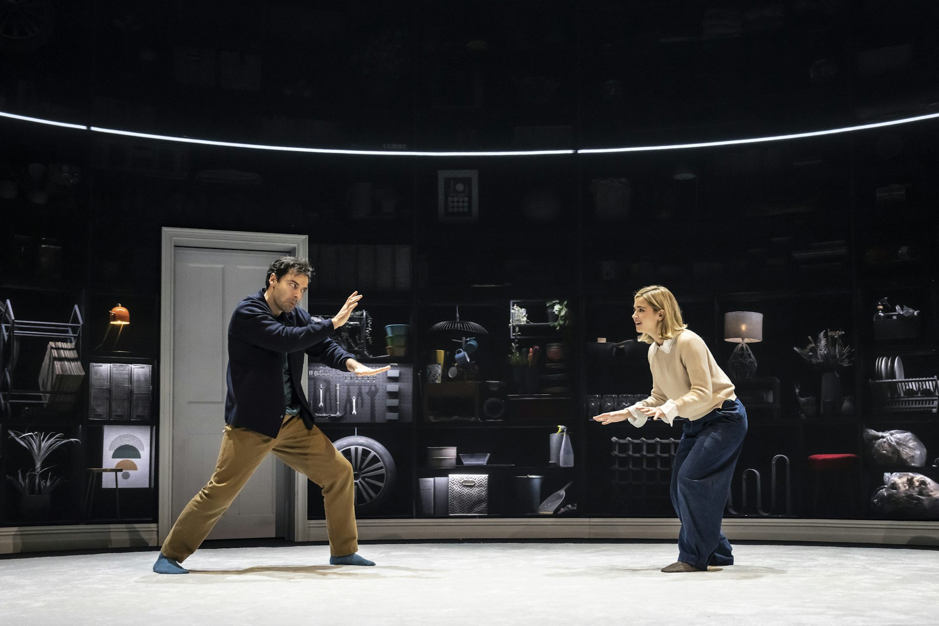 Tow actors on a stage.