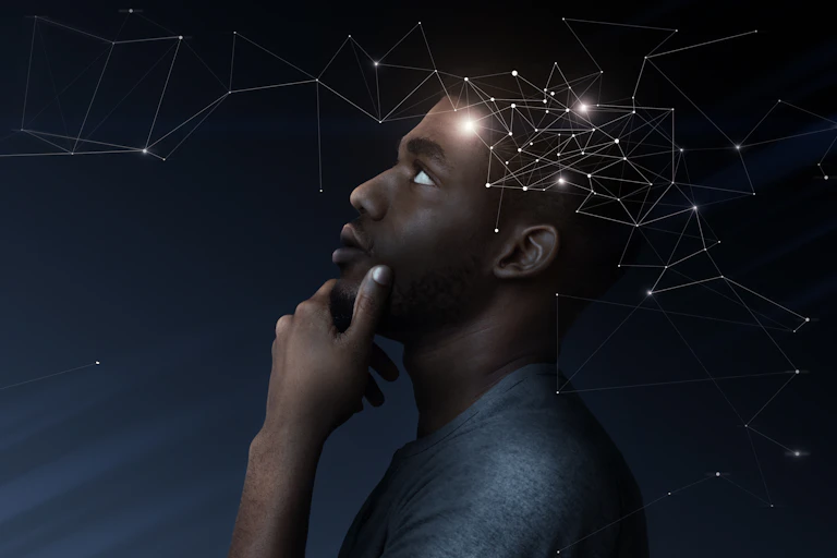 Thoughtful man with illustration of brain activity process