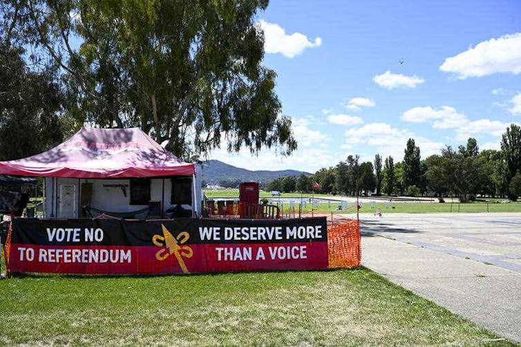 A banner reading ‘Vote No to Referendum’ is seen at the Aboriginal tent Embassy in Canberra.