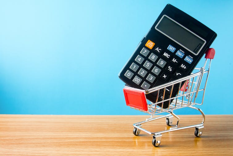 calculator and cart in shopping online concept