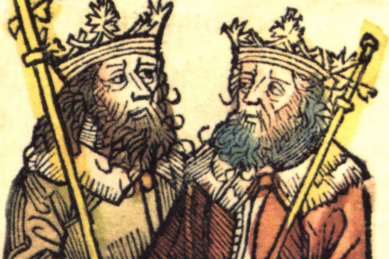 A woodcut showing the two kings with beards in their crowns, looking at each other.