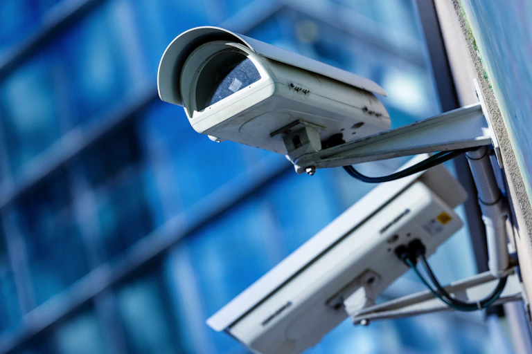 A security camera on a building.