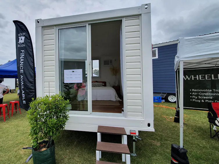 View from the outside of a home made from a shipping container