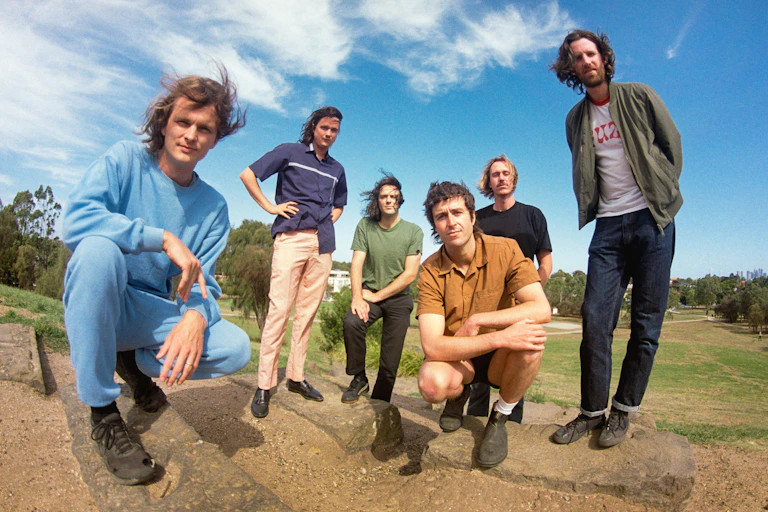 King Gizzard and the Lizard Wizard posing for a press shot
