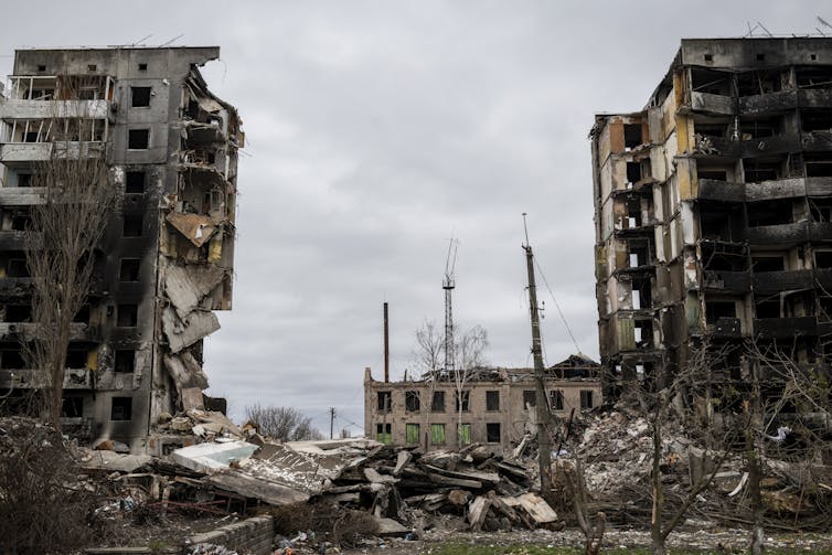 Debris and decimated apartment buildings