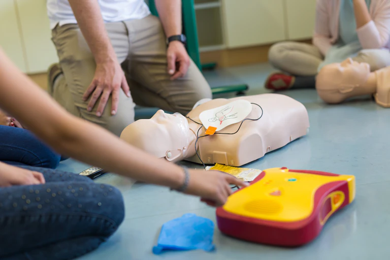 A CPR dummy being used in CPR training
