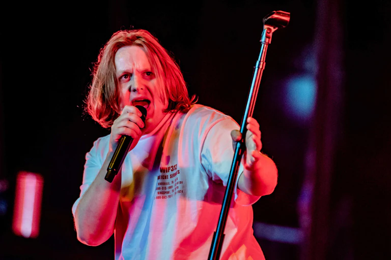Lewis Capaldi singing on stage