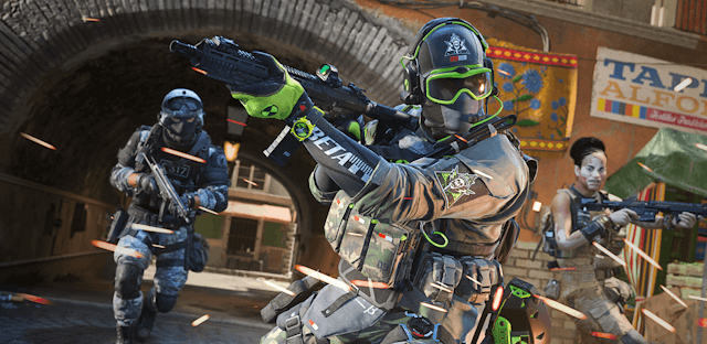 A still from COD: Modern Warfare 2 showing fighters in grey helmets with neon green trim.