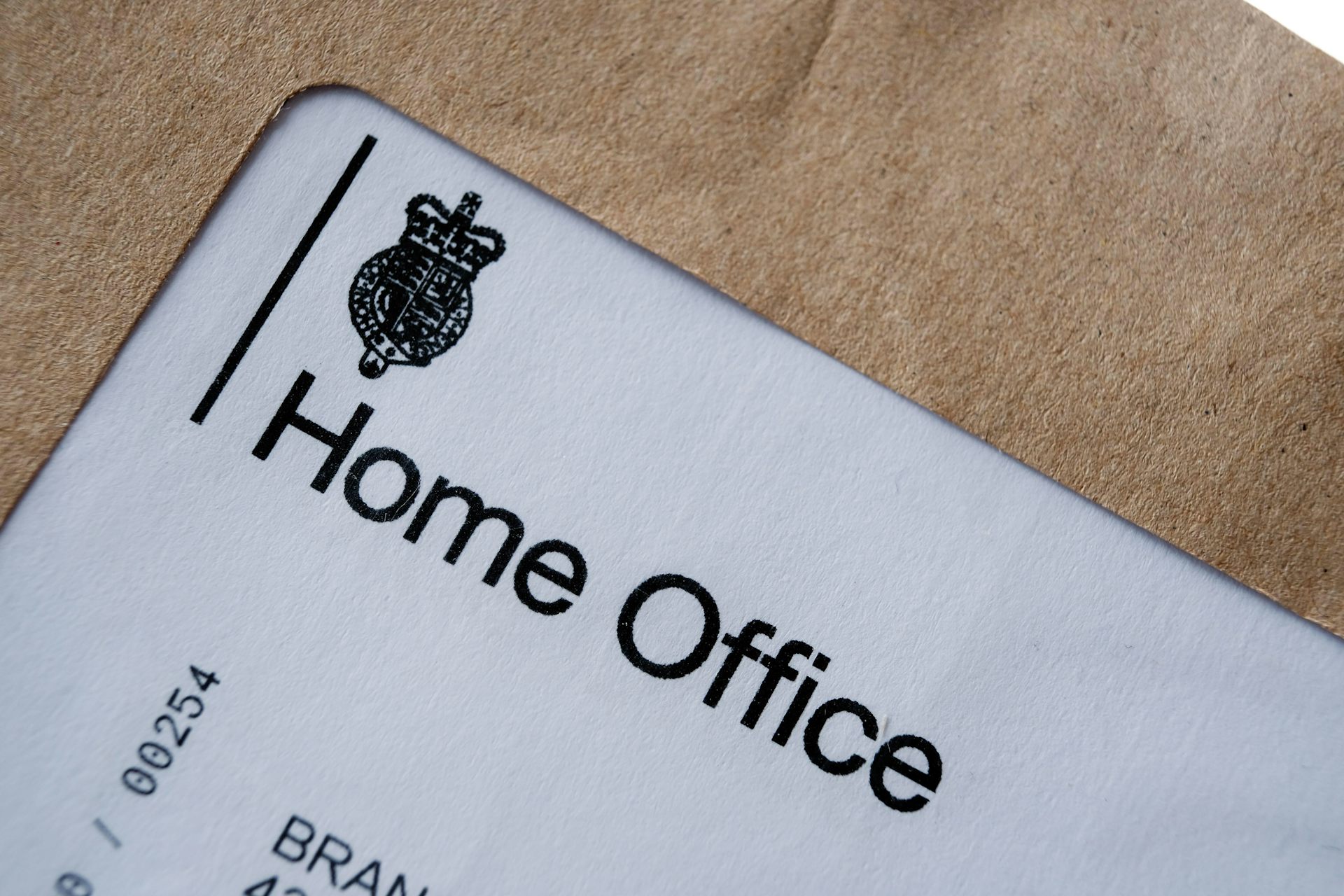 Close-up image of a Home Office letter in a brown envelop