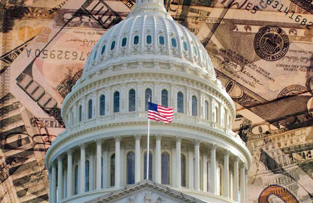 The U.S. Capitol building against the backdrop of American currency.
