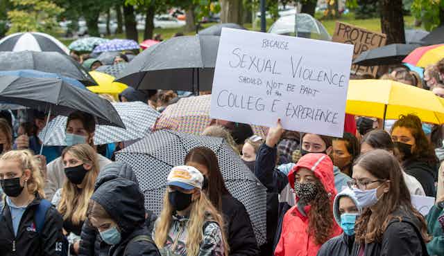 Students seen at a rally protesting sexual assault.
