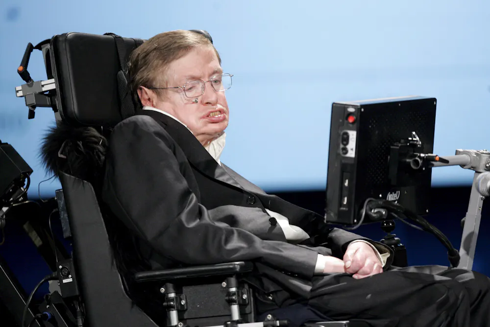 Computer Hawking Futurists predict a point where humans and machines become one. But ...