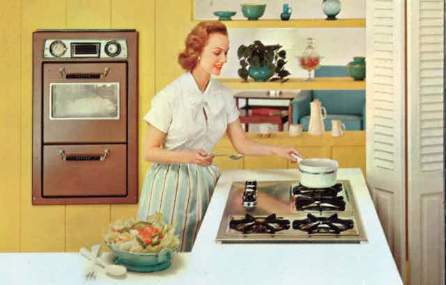 Woman in a vintage kitchen