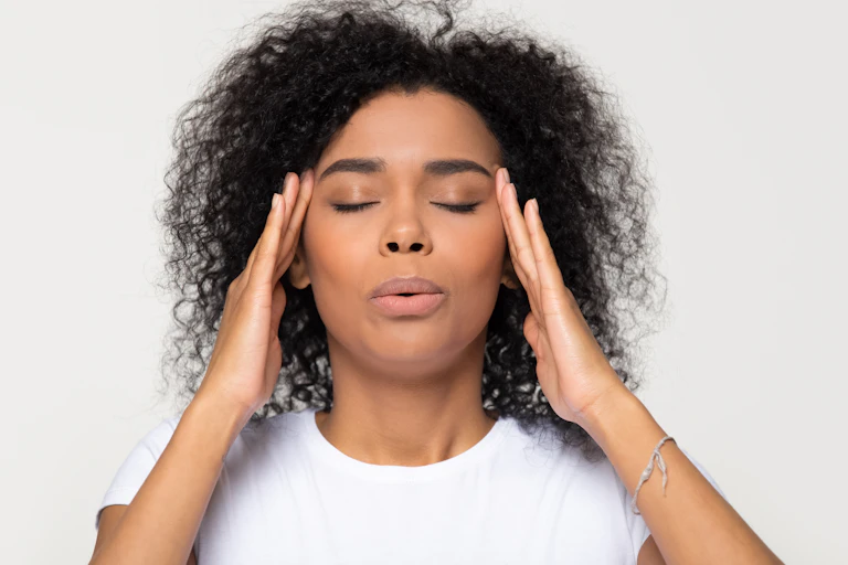 Woman breathing calming down relieving headache or managing stress