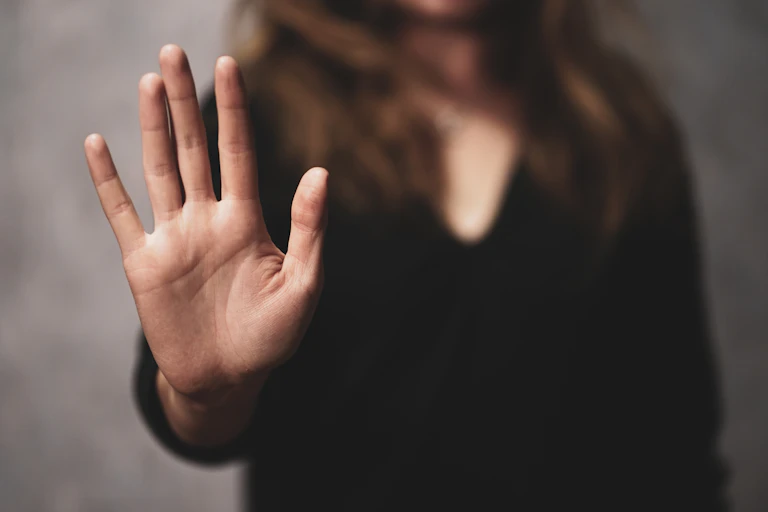Woman holding out her hand