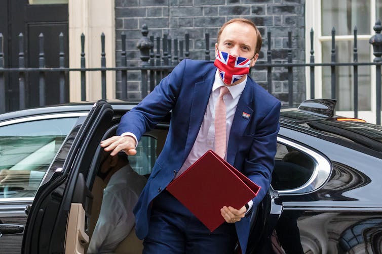 Matt Hancock, the former health secretary, gets out of his ministerial car in Downing Street.
