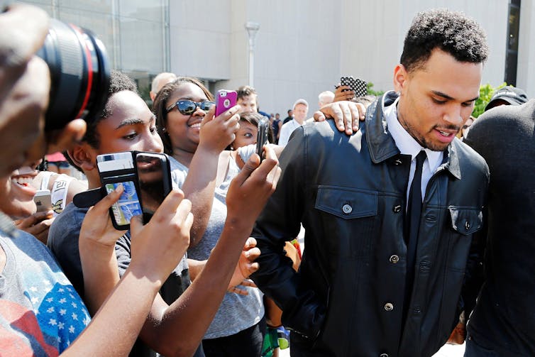 Chris Brown: a fandom expert on how racialised loyalty helps the controversial singer retain his fans