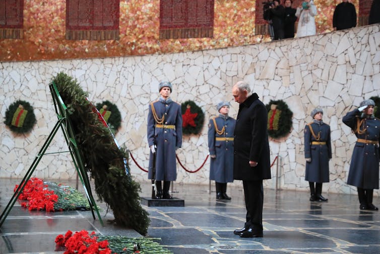 Vladimir Putin pays tribute at the Stalingrad memorial in Volgograd.