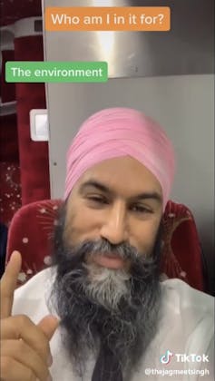 A TikTok screenshot of an Indian man in a pink turban pointing upwards to text that says 'Who am I in it for? The environment.'