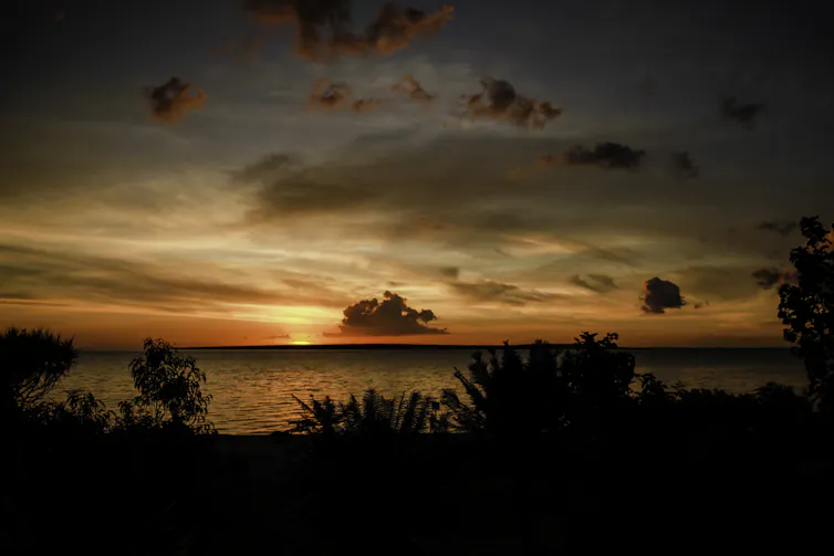 A sunset over the water.