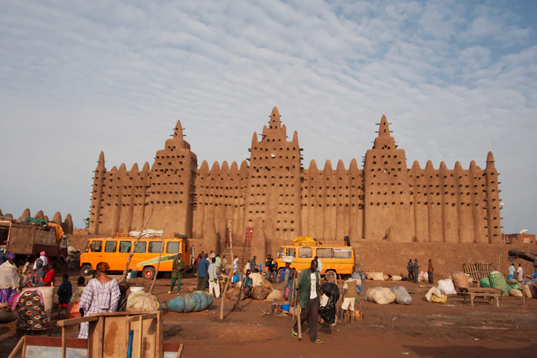 Street market and the Great Mosque of Djenné, Mali.