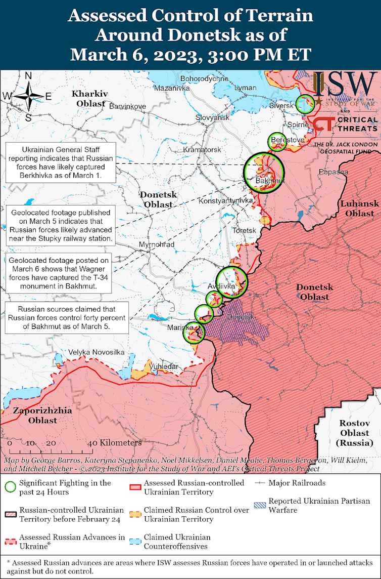 Map of conflict in Donbas region of Ukraine with Russian territory/advances in red and circles highlighting recent class=