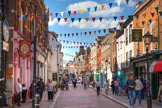 A street scene with colourful bunting.