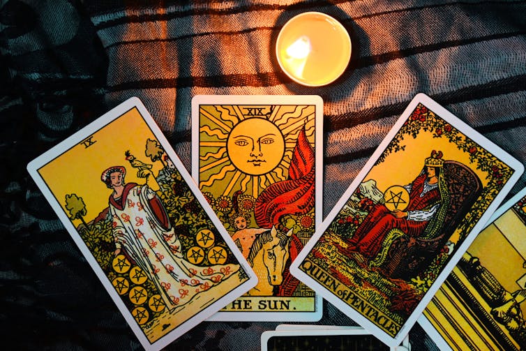 Three tarot cards.