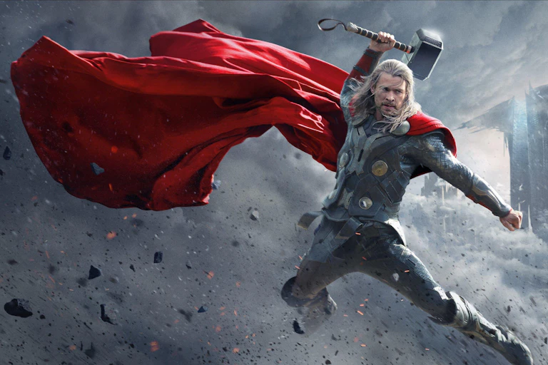 The red-caped Norse god Thor with his hammer held aloft.
