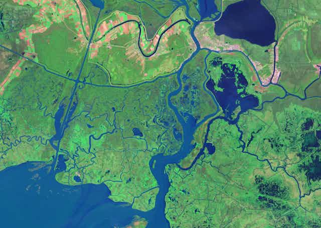 Satellite image showing rivers, ocean and developed property along the Delta.