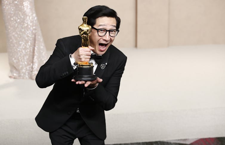 Ke Huy Quan with his Oscar for Best Supporting Actor for Everything Everywhere All at Once.Caroline Brehman/ EPA