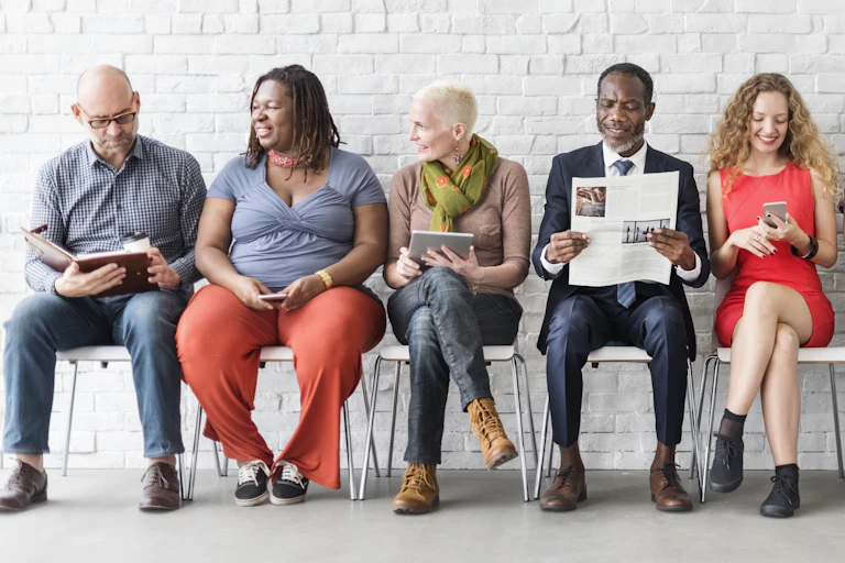 Diverse Group of People Community Togetherness Technology Sitting Concept, newspapers, news, reading, talking, understanding.