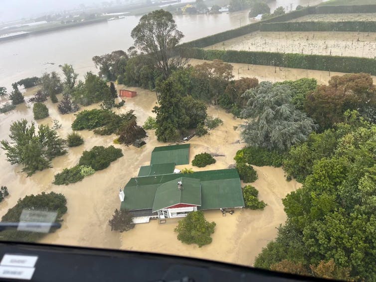 A Flooded house and paddocks after Cyclone Gabrielle