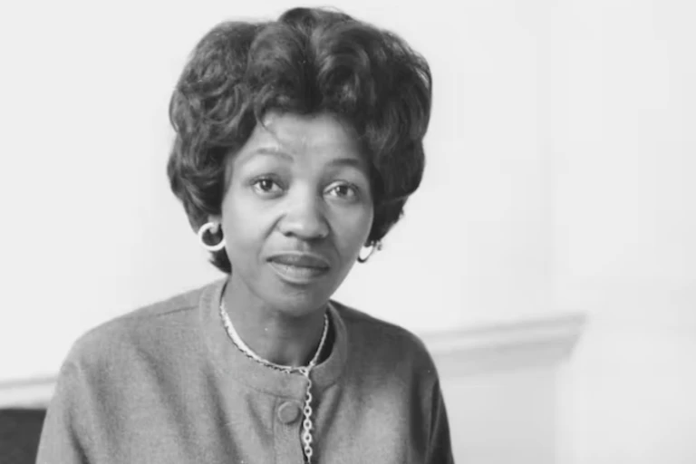 portrait of woman sitting at a work desk