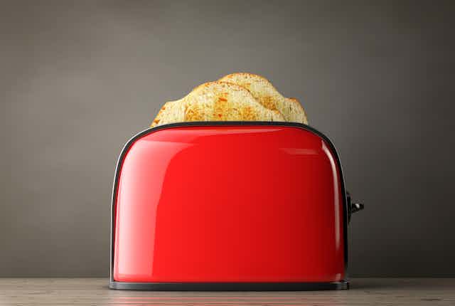 toast in red toaster