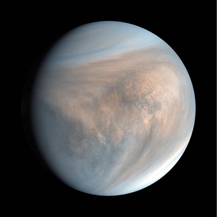 The globe of Venus shrouded in cloud