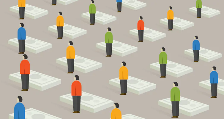 A concept image of people standing next to stacks of bank notes.