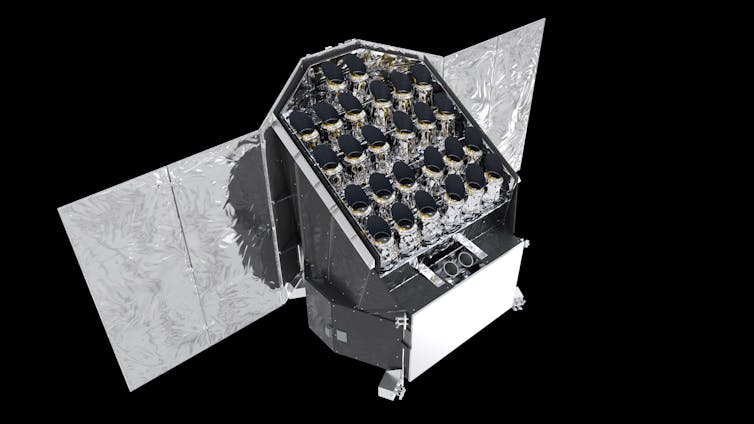 Se ve el telescopio multitubo, con unas veinte aberturas, y los paneles solares del satélite de la ESA