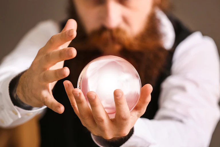 A magician holding a crystal ball