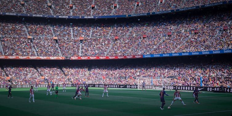 Photographie d’un match de football à Barcelone