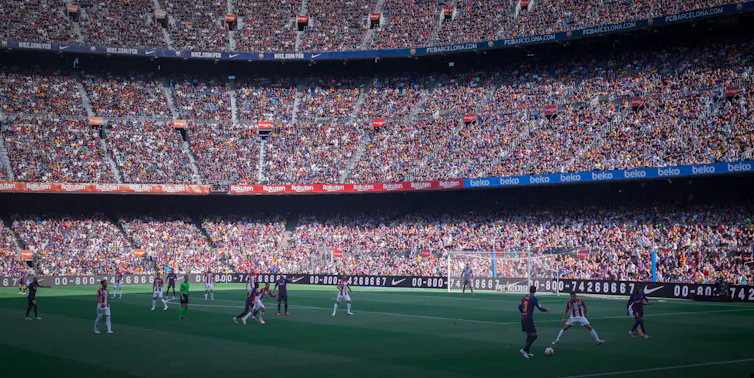 Photographie d’un match de football à Barcelone