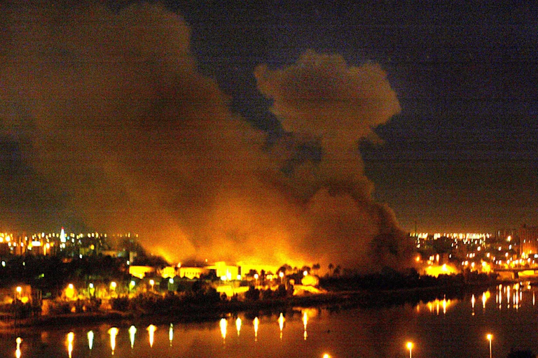 Fires along the river Tigris in Baghdad during US-led bombing raids in March 2003.